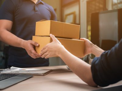 parcel delivery with good depth of field. Friendly worker with high quality delivery service. parcel delivery with good depth of field. Friendly worker with high quality delivery service.